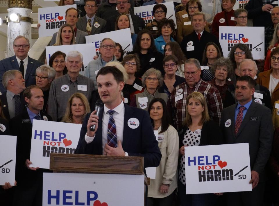 Norman Woods, the director of Family Heritage Alliance Action, speaks to HB 1080 that would restrict gender affirming care for children in the Capitol Rotunda on Tuesday, Jan. 17, 2023.