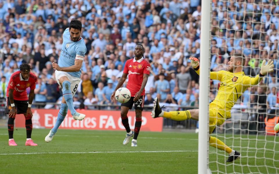  Ilkay Guendogan of Manchester City scores a goal past David De Gea - Getty Images/Mike Hewitt