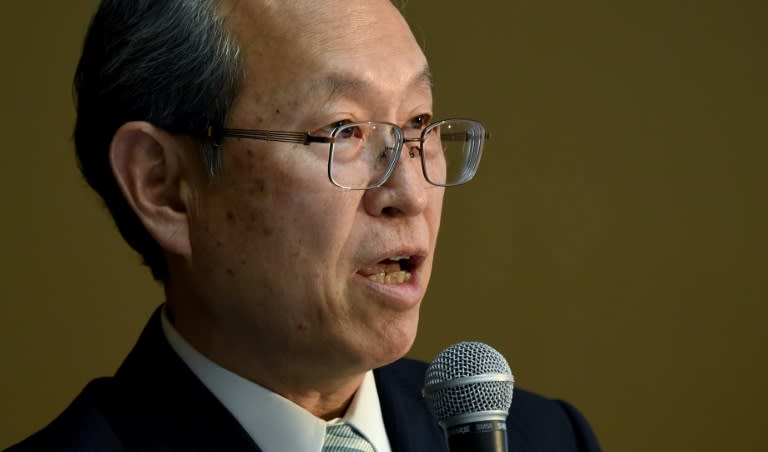 Satoshi Tsunakawa, president of Toshiba, answers questions during a press conference at the company's headquarters in Tokyo on August 10, 2017