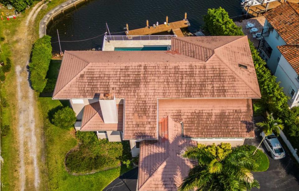 View of the Coral Gables home at 11025 Tanya St. where police say a boat matching the description of the vessel that struck and killed Ella Adler near Nixon Beach Sandbar on Saturday was located and seized from the deck in the home back canal, in Coral Gables, on Tuesday, May 14, 2024.