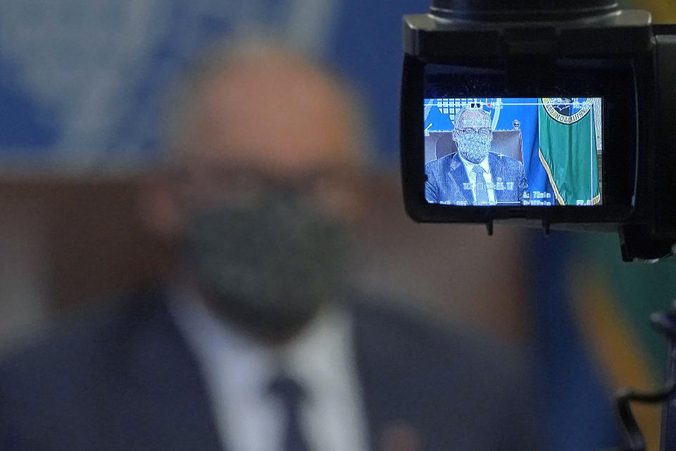 Washington Gov. Jay Inslee is shown on a TV camera viewfinder monitor as he speaks during a news conference, Sunday, Nov. 15, 2020, at the Capitol in Olympia, Wash. Inslee announced new restrictions on businesses and social gatherings for the next four weeks as the state continues to combat a rising number of coronavirus cases. (AP Photo/Ted S. Warren)