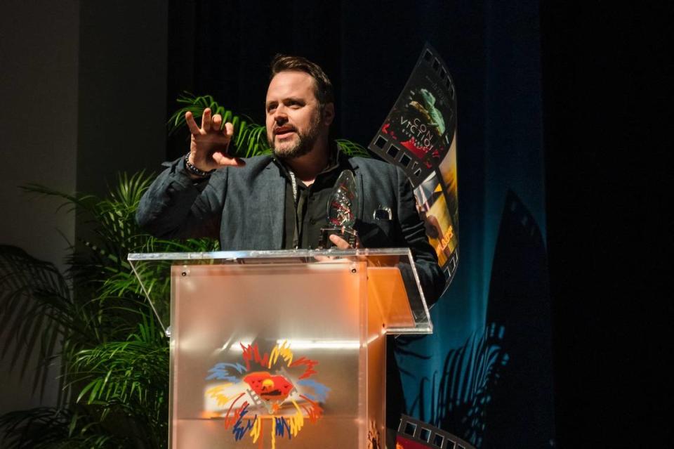 Thomas Torrey of Fort Mill, S.C. accepts an award on behalf of “Long December,” which took home four awards during the Beaufort International Film Festival.