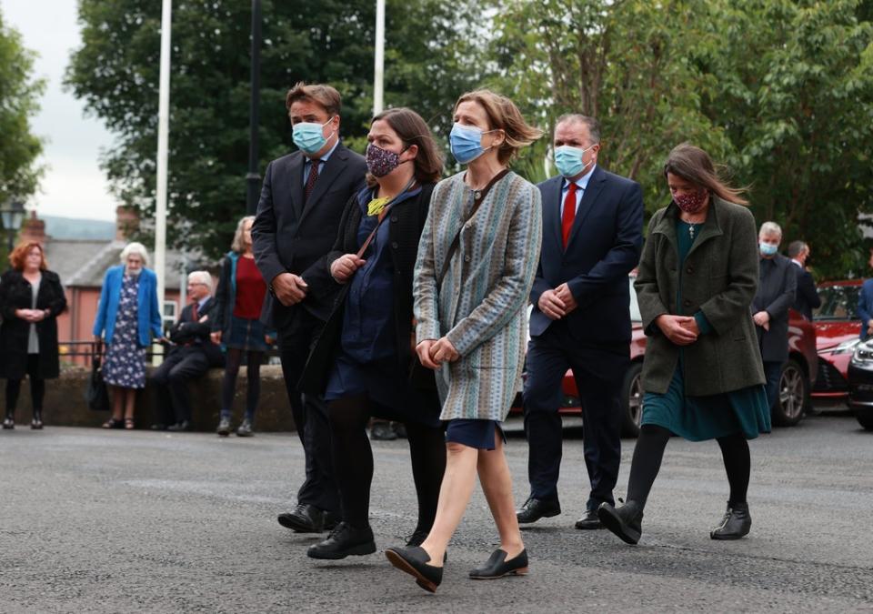 (Left-right) Pat Hume’s children John Junior, Mo, Therese, Aidan (left back) and Aine (right back) arrive at St Eugene’s Cathedral (Liam McBurney/PA) (PA Wire)