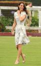 <p>In a Jenny Packham dress and L. K. Bennett shoes at a match at the Santa Barbara Polo and Racquet Club</p>