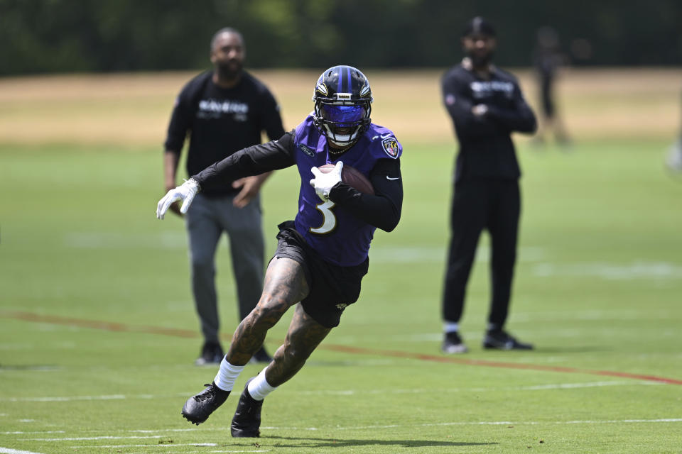 Baltimore Ravens wide receiver Odell Beckham Jr. (3) runs a drill during NFL football practice Tuesday, June 13, 2023, in Owings Mills, Md. (AP Photo/Gail Burton)