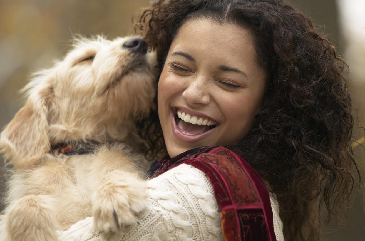 Pets can bring joy and companionship, as well as financial worries, loss and logistical challenges. <a href="https://www.gettyimages.com/detail/photo/cheerful-woman-hugging-her-dog-royalty-free-image/532716410?phrase=pet+ownership&adppopup=true" rel="nofollow noopener" target="_blank" data-ylk="slk:Dann Tardif/Stone via Getty Images;elm:context_link;itc:0;sec:content-canvas" class="link ">Dann Tardif/Stone via Getty Images</a>