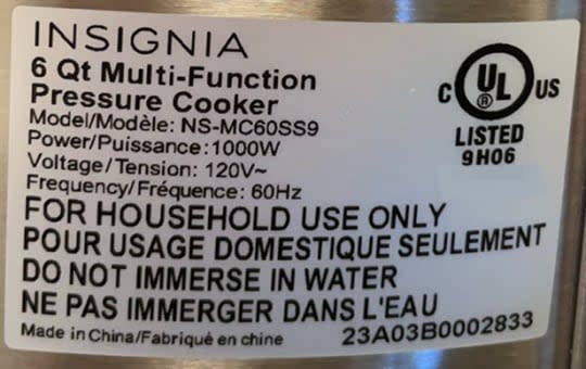 Two types of Insignia branded pressure cookers are being recalled in Canada and the U.S. because a defect on the inner receptacle can cause them to erupt when opened. The model number is shown on the side of the product, shown here. (Health Canada - image credit)