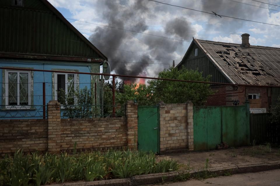 A house burns after a Russian military strike in Kostiantynivka (REUTERS)