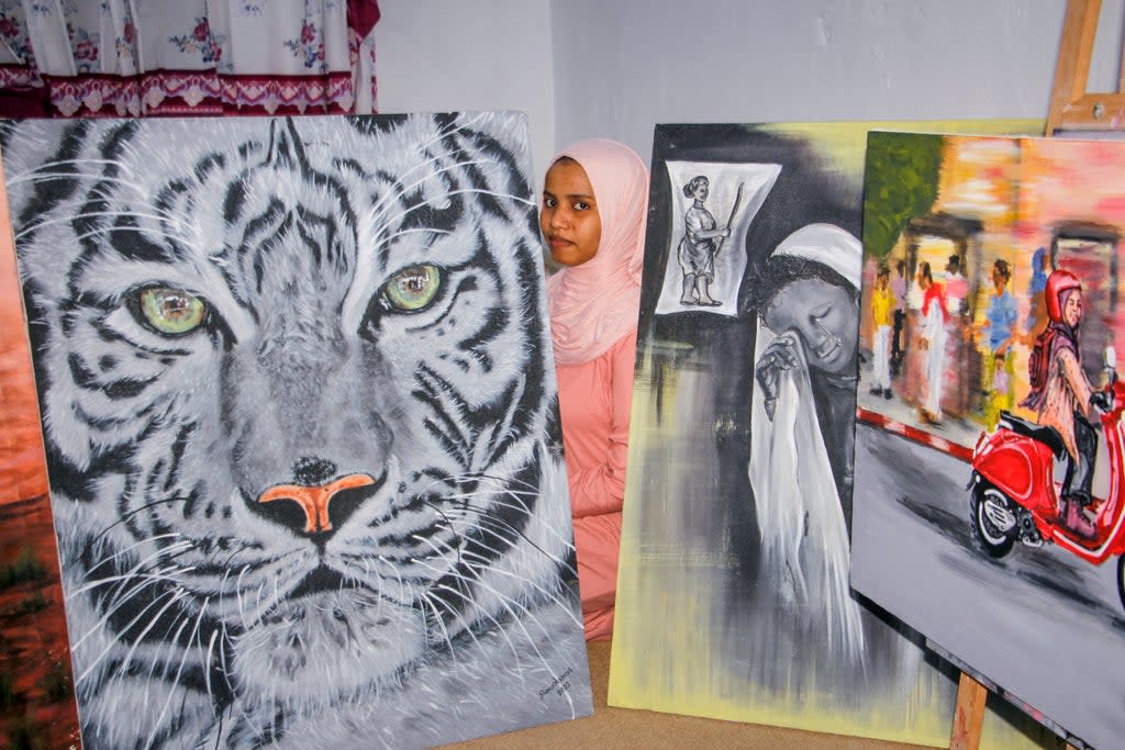 Somalia Female Artist (Copyright 2021 The Associated Press. All rights reserved.)