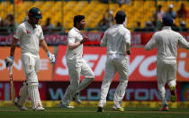 Cricket - India v Australia - Fourth Test cricket match - Himachal Pradesh Cricket Association Stadium, Dharamsala, India - 25/03/17 - India's Umesh Yadav celebrates after dismissing Australia's Shaun Marsh. REUTERS/Adnan Abidi