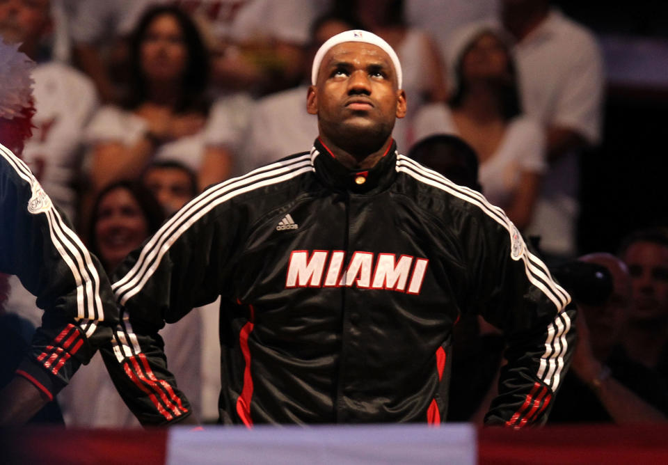 MIAMI, FL - MAY 31: (L-R) LeBron James #6 of the Miami Heat stands for the performance of the National Anthem against the Dallas Mavericks in Game One of the 2011 NBA Finals at American Airlines Arena on May 31, 2011 in Miami, Florida.&nbsp;