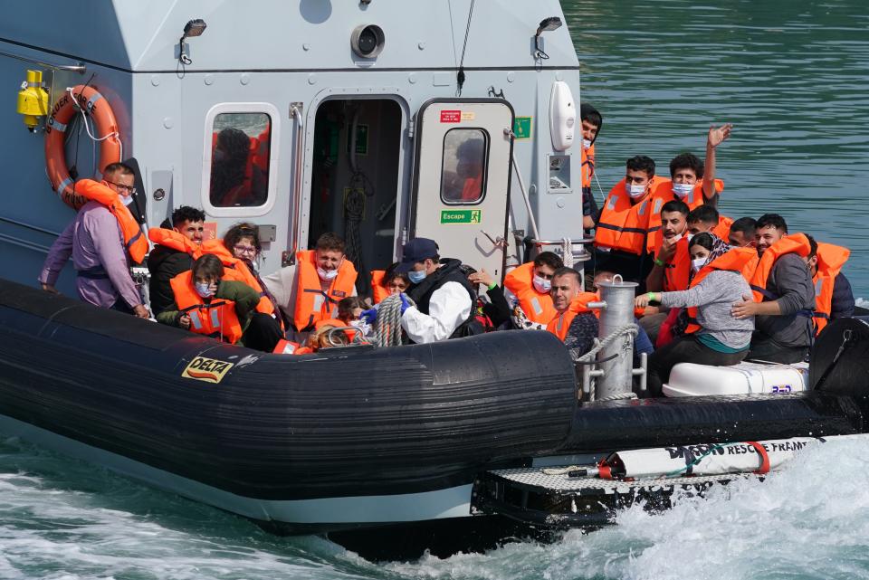 A group of people thought to be migrants are brought in to Dover, Kent, onboard a border force boat following a small boat incident in the Channel (Gareth Fuller/PA) (PA Wire)