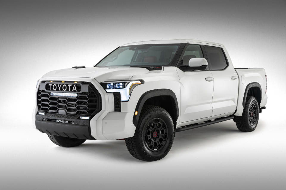 This photo provided by Toyota shows the 2022 Toyota Tundra TRD. Toyota is dumping the big V8 engine in the latest redesign of its Tundra full-size pickup truck, a bold move in a market that likes big, powerful engines. The 381 horsepower, 5.7-liter V8 will be replaced by a base 389 horsepower 3.5-liter twin-turbo V6. (Toyota via AP)