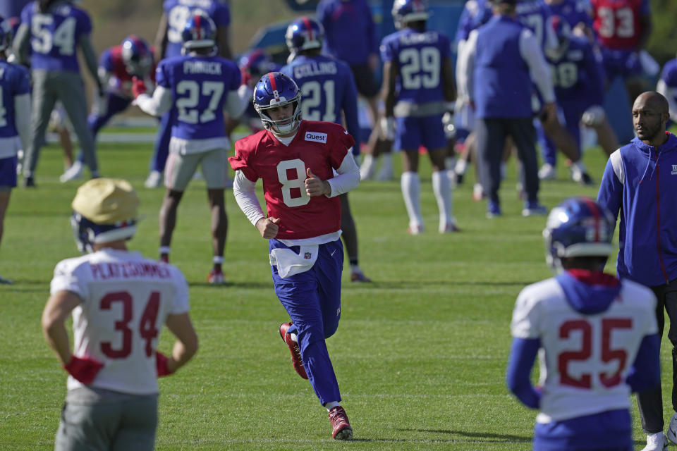 New York Giants quarterback Daniel Jones, number 8, attends a practice session at Hanbury Manor in Ware, England, Friday, Oct. 7, 2022 ahead the NFL game against Green Bay Packers at the Tottenham Hotspur stadium on Sunday. (AP Photo/Kin Cheung)