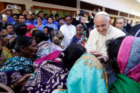 Pope Francis meets with sick people and staff of the Mother Teresa House in the Dhaka's Tejgaon neighborhood, Bangladesh, December 2, 2017. REUTERS/Andrew Medichini/Pool