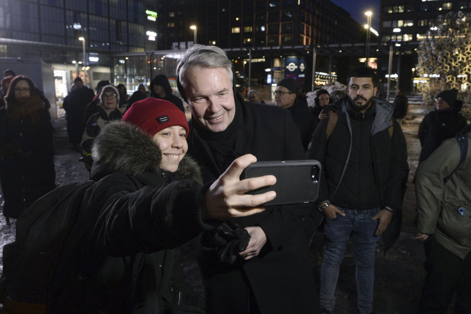 FILE - Pekka Haavisto, Green Party backed candidate for a nonpartisan constituency association poses for a selfie during a campaign rally, in Helsinki, Finland, Monday Jan. 29, 2024. Finns on Sunday, Feb. 11, 2024 will pick a new head of state from the array of two experienced politicians whose main will be to steer the Nordic country’s foreign and security policy at an unprecedented time when the country is now a NATO member following Russia’s invasion of Ukraine, and its eastern border with Russia remains closed. (Mikko Stig/Lehtikuva via AP, File)