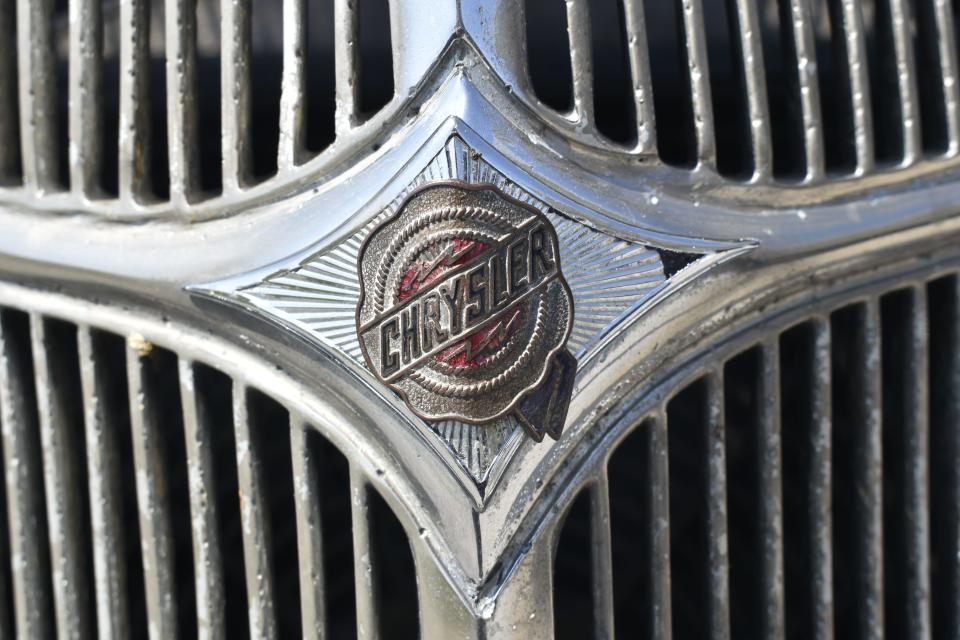 The grille nameplate on Pat Conder's 1936 Chrysler