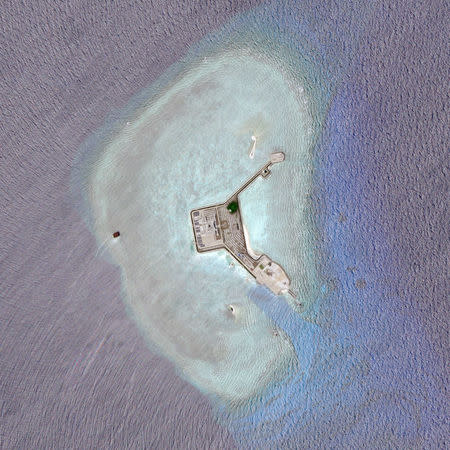 Satellite photo dated April 15, 2018 shows Gaven Reef. Planet Labs Inc/Handout via REUTERS