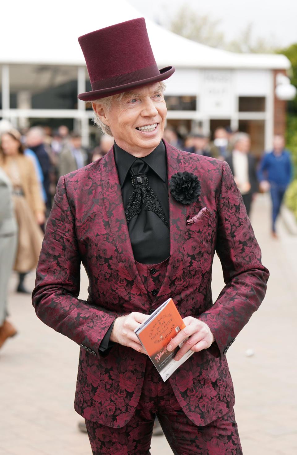 A racegoer on day two of the 2024 Cheltenham Festival at Cheltenham Racecourse. Picture date: Wednesday March 13, 2024.