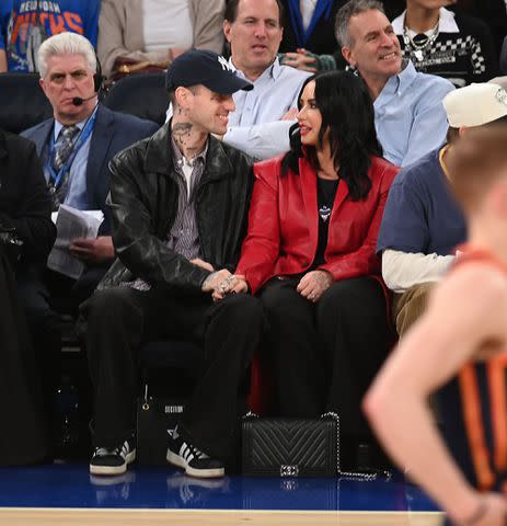 <p>Michael Simon/Shutterstock</p> Jutes and Demi Lovato at the Indiana Pacers v New York Knicks in New York City on Feb. 1, 2024