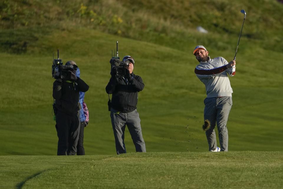 Team Europe's Tyrrell Hatton hits on the second hole during a foursomes match the Ryder Cup at the Whistling Straits Golf Course Saturday, Sept. 25, 2021, in Sheboygan, Wis. (AP Photo/Jeff Roberson)