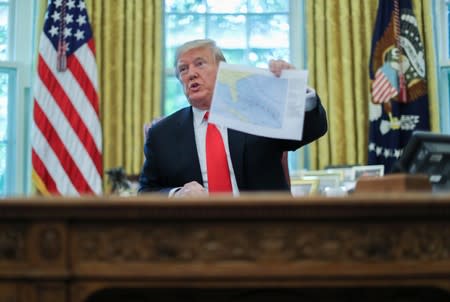 U.S. President Trump receives a Hurricane Dorian update at the White House in Washington