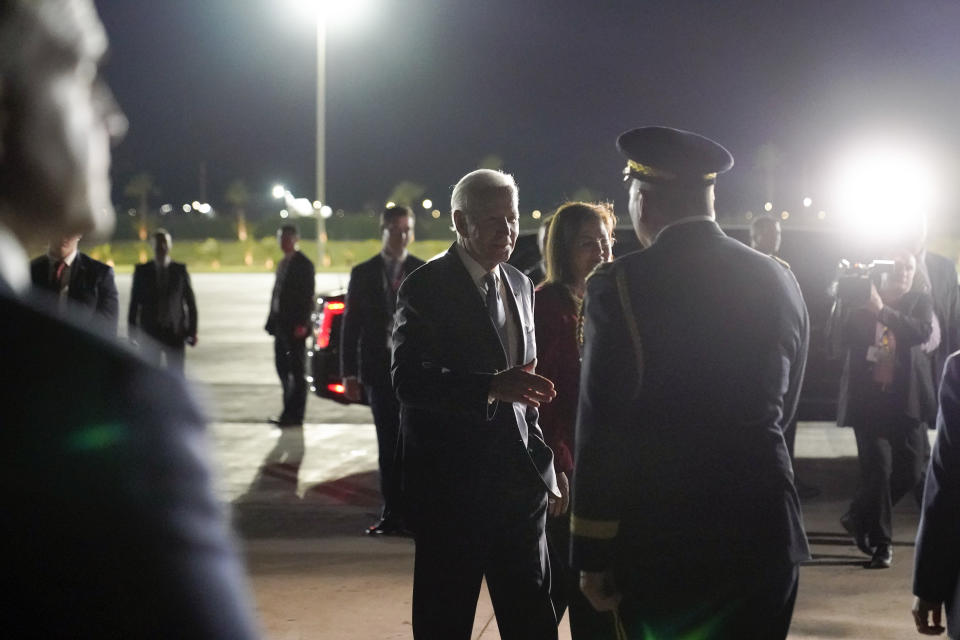 President Joe Biden greets officials before boarding Air Force One upon departure, Friday, Nov. 11, 2022, at Sharm el-Sheikh, Egypt. Biden is headed to the Association of Southeast Asian Nations (ASEAN) summit in Phnom Penh, Cambodia. (AP Photo/Alex Brandon)
