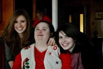 Frannie, center, poses for a photo with her nieces.