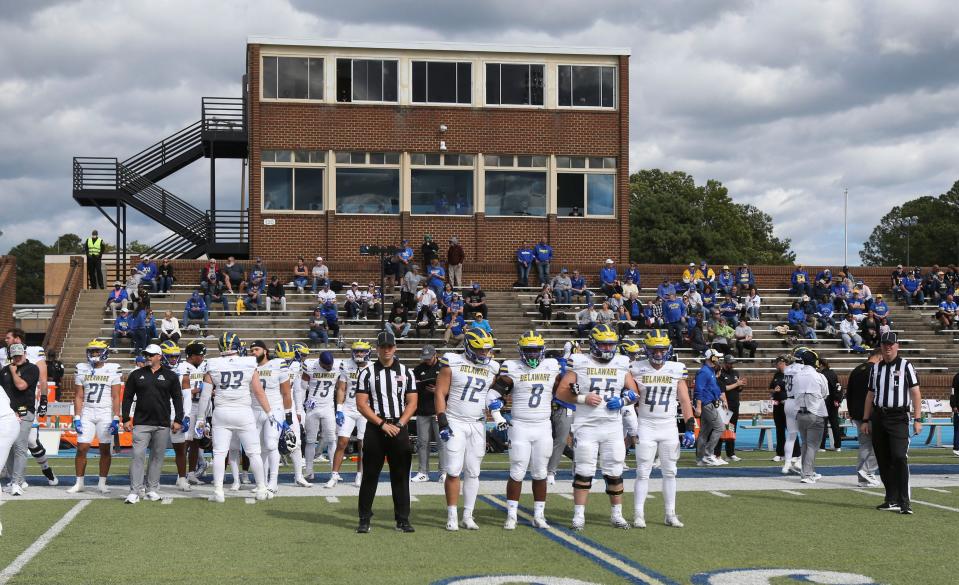 Delaware captains (from left) Chase McGowan, Ethan Saunders, Brock Gingrich and Dillon Trainer wait for the coin toss before the first half at Armstrong Stadium at Hampton University in Hampton, Va., Saturday, Oct. 21, 2023.