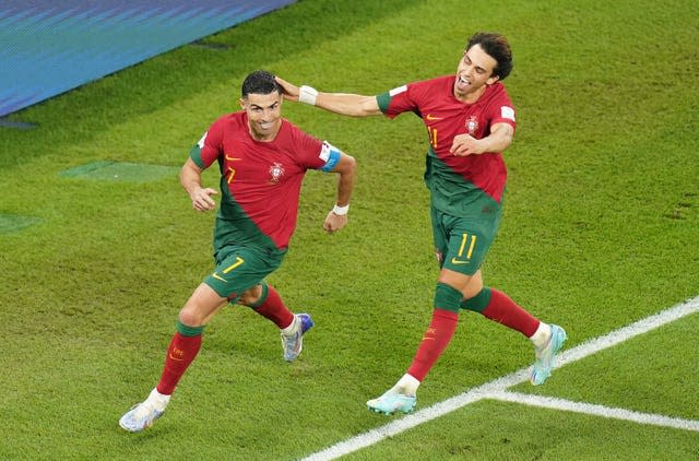 Cristiano Ronaldo, left, celebrates his World Cup goal against Ghana