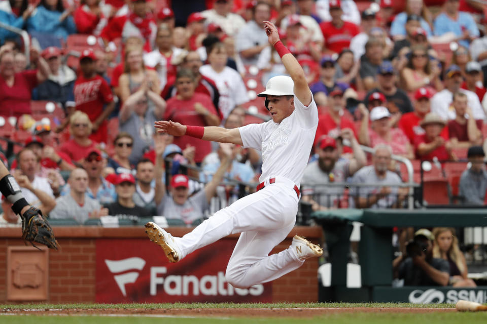 St. Louis Cardinals' Tommy Edman scores during the second inning of a baseball game against the Colorado Rockies Sunday, Aug. 25, 2019, in St. Louis. (AP Photo/Jeff Roberson)