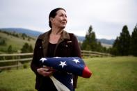 Cattle rancher Arlene Mackay, 80, poses at her ranch in Avon