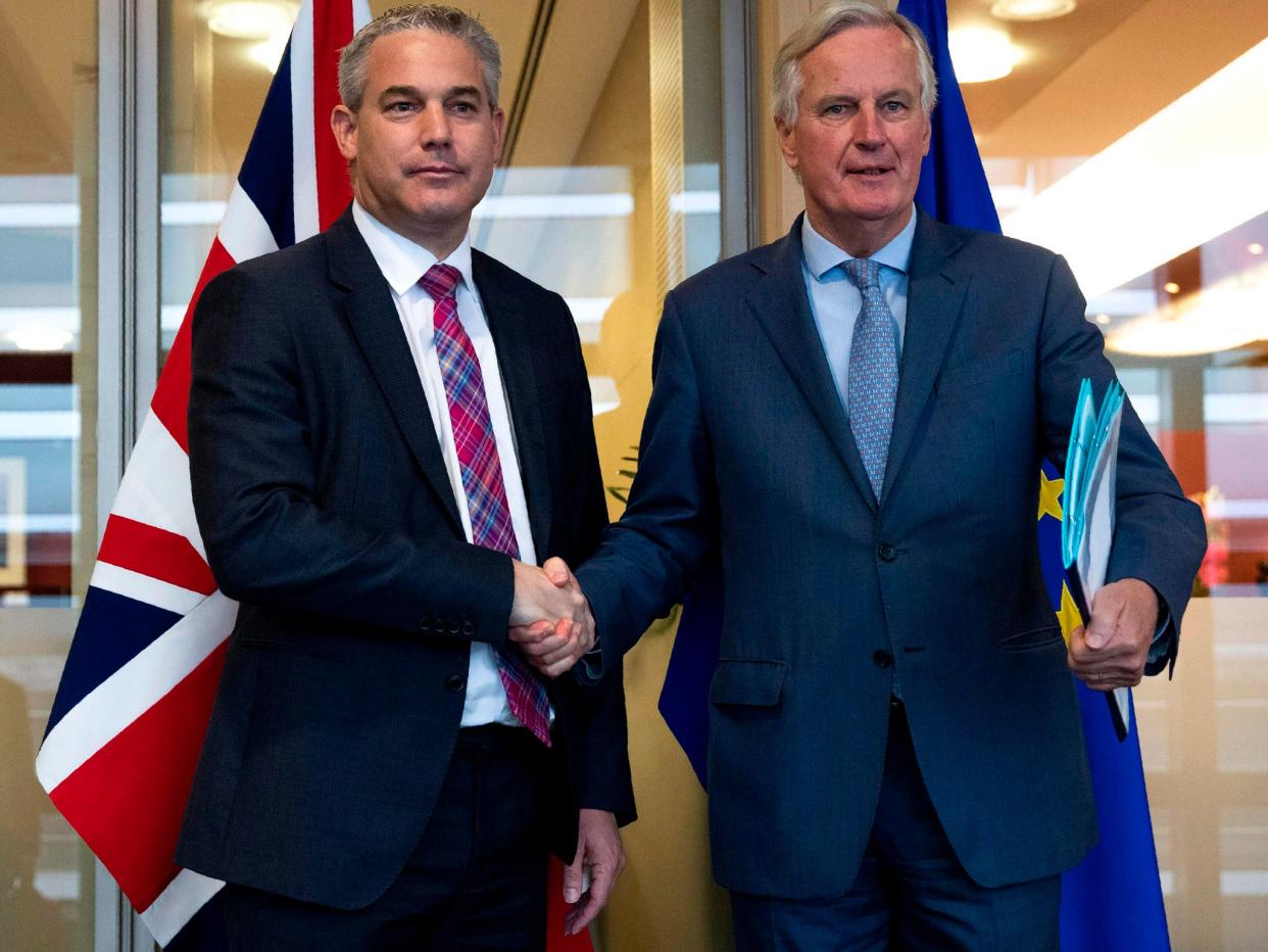 Brexit secretary Stephen Barclay shakes hands with European Union chief Brexit negotiator Michel Barnier: POOL/AFP via Getty Images