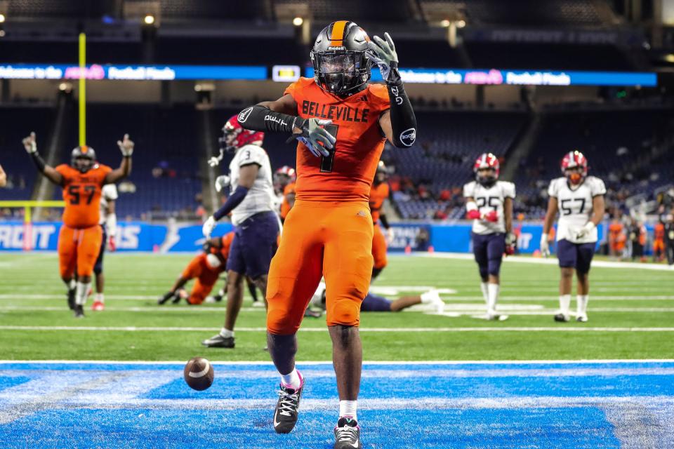 Belleville running back Jeremiah Beasley celebrates a touchdown against Southfield A&T during the second half of the Division 1 state final at Ford Field in Detroit on Sunday, Nov. 26, 2023.