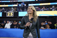 NBC Sports sideline reporter Melissa Stark stands on the field at halftime during an NFL football game between the Los Angeles Chargers and the Miami Dolphins on Dec. 11, 2022, in Inglewood, Calif. (AP Photo/Jae C. Hong)