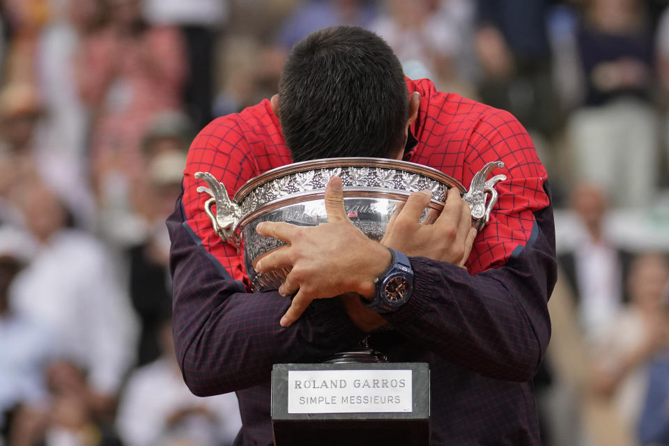 Serbia's Novak Djokovic celebrates winning the men's singles final match of the French Open tennis tournament against Norway's Casper Ruud in three sets, 7-6, (7-1), 6-3, 7-5, at the Roland Garros stadium in Paris, Sunday, June 11, 2023. Djokovic won his record 23rd Grand Slam singles title, breaking a tie with Rafael Nadal for the most by a man. (AP Photo/Christophe Ena)