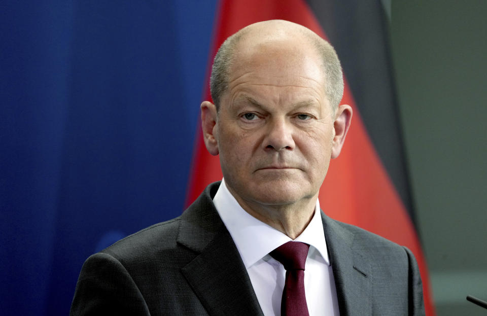 German Chancellor Olaf Scholz attends a joint press conference after a meeting with the Emir of Qatar, Sheikh Tamim bin Hamad Al Thani, at the chancellery in Berlin, Germany, Friday, May 20, 2022. (AP Photo/Michael Sohn)