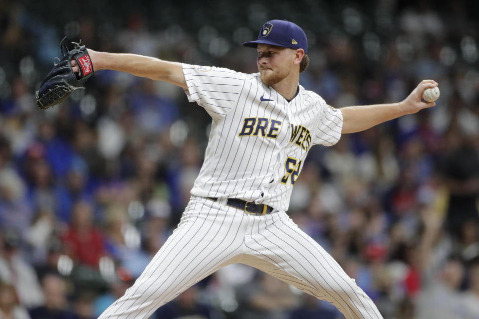 Milwaukee Brewers' Eric Lauer pitches during the first inning of a baseball game against the New York Mets Friday, Sept. 24, 2021, in Milwaukee. (AP Photo/Aaron Gash)