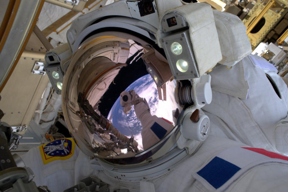 This photo made by French astronaut Thomas Pesquet of the European Space Agency shows him in a selfie photograph with the Earth reflected in his visor, during a spacewalk outside the International Space Station on Friday, Jan. 13, 2017. Pesquet, a rookie astronaut, became France's first spacewalker in 15 years. He called it "a big day." (Thomas Pesquet via AP)