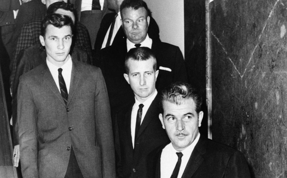 Clyde Amsler, Barry Worthington Keenan and John W Irwin (l-r) leave the LA court in 1964 - Bettmann