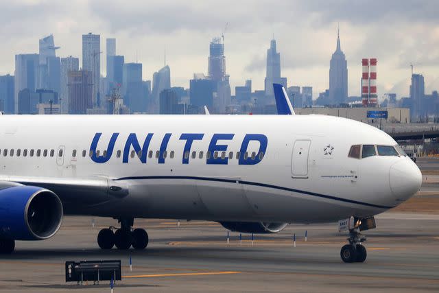 <p>Gary Hershorn/Getty</p> United Airlines airplane -- stock image