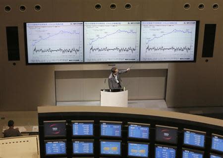 A man speaks during a seminar about stock investment at Tokyo Stock Exchange June 10, 2013. REUTERS/Yuya Shino