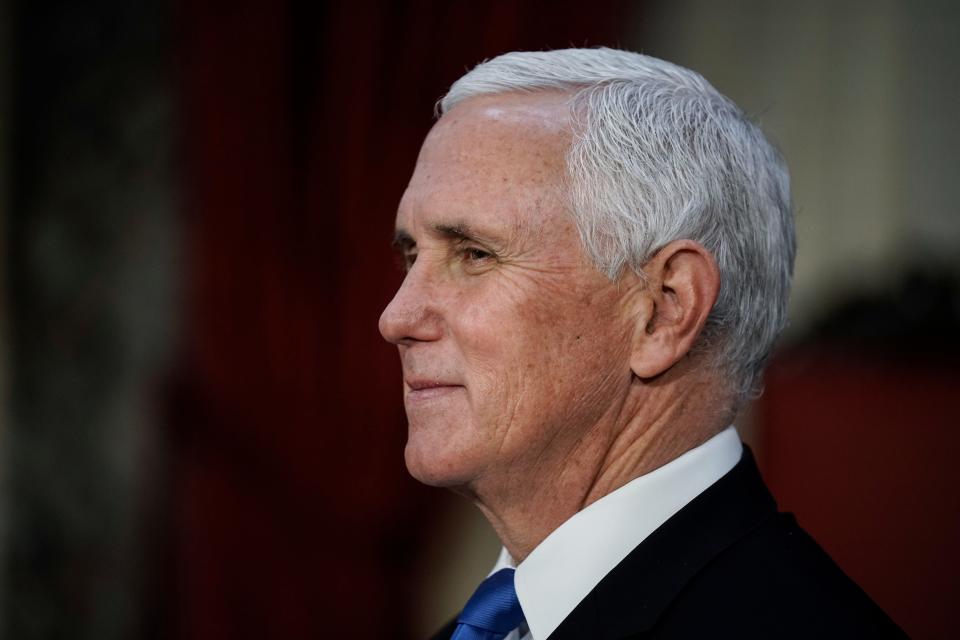 Vice President Mike Pence finishes a swearing-in ceremony for senators in the Old Senate Chamber at the Capitol in Washington, D.C., Sunday, Jan. 3, 2021.