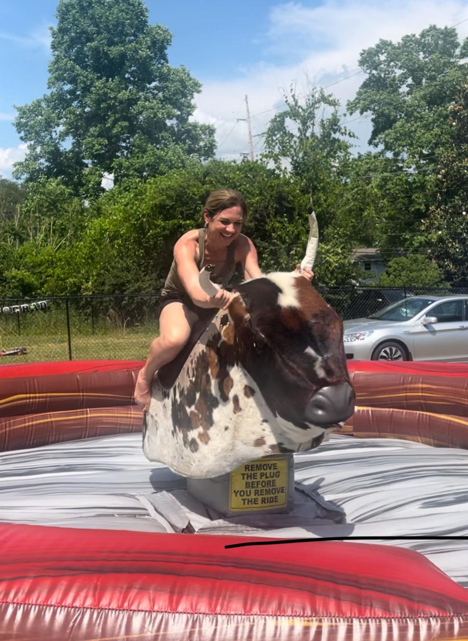 Rev. Katina Sharp, pastor at Powell Presbyterian Church, can grab the bull by the horns when it comes to raising money.