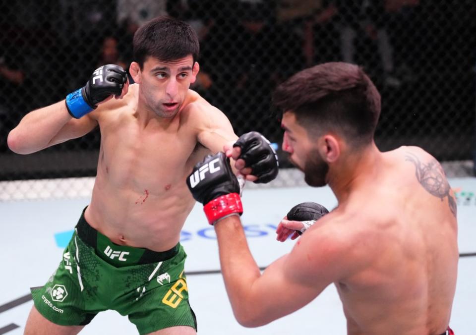 LAS VEGAS, NEVADA – MARCH 02: (L-R) Steve Erceg of Australia punches Matt Schnell in a flyweight bout during the UFC Fight Night event at UFC APEX on March 02, 2024 in Las Vegas, Nevada. (Photo by Jeff Bottari/Zuffa LLC via Getty Images)