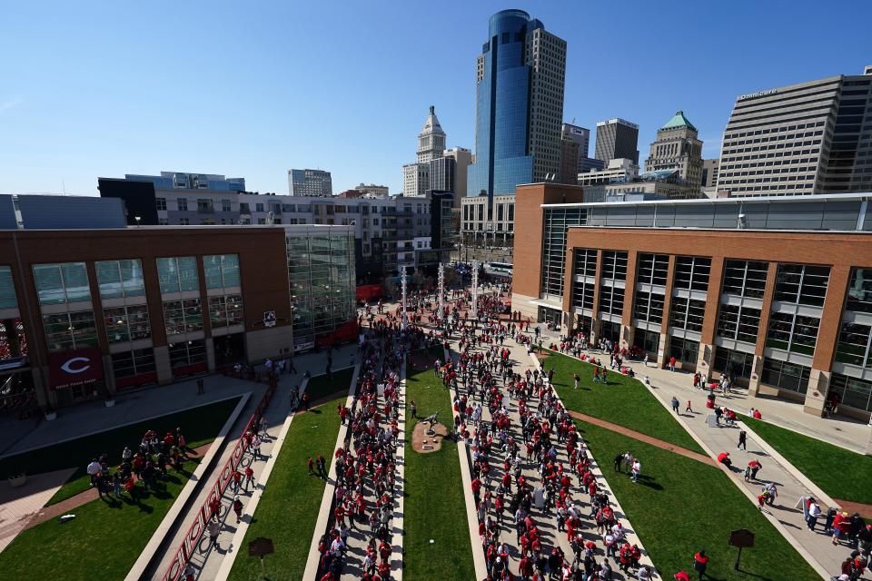 Cincinnati Reds fans file into Great American Ball Park on Thursday.