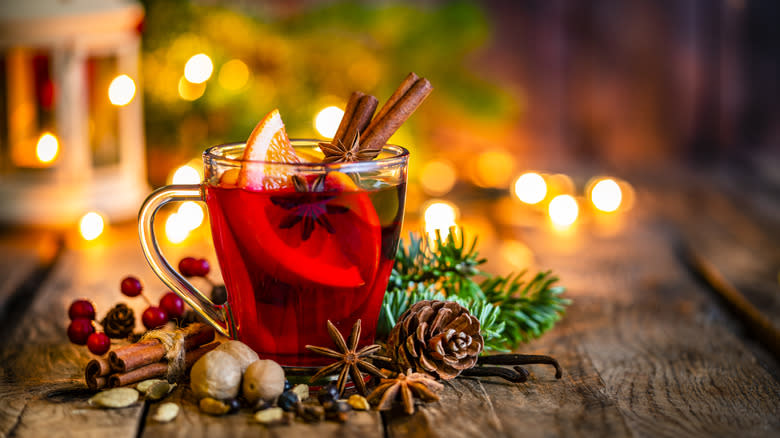 mulled wine surrounded by spices