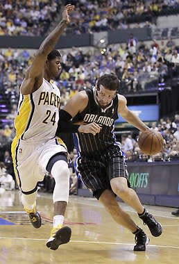 Indiana’s Paul George defends Orlando’s Hedo Turkoglu during playoff game on May 8. The Pacers play the Miami Heat in the second round beginning Sunday. Michael Conroy | Associated Press