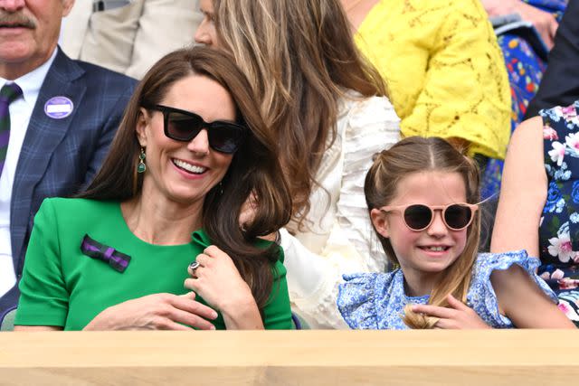 <p>Getty</p> Kate Middleton and Princess Charlotte watch Wimbledon on July 16.