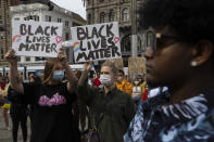 People take part in a Black Lives Matter protest in Amsterdam, Netherlands, Monday, June 1, 2020, to protest against the recent killing of George Floyd, a black man who died in police custody in Minneapolis, U.S.A., after being restrained by police officers on Memorial Day. (AP Photo/Peter Dejong)